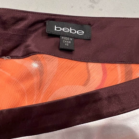 BEBE top, orange in design, size xs, LIKE NEW - Picture 9 of 11